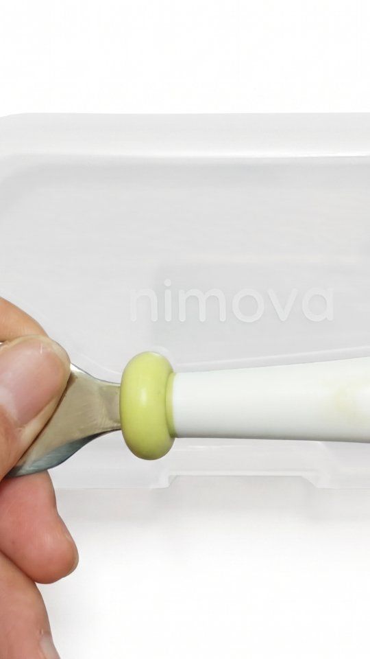 Cutlery in a parent's hand